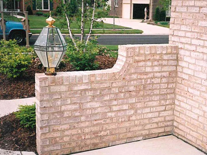 The garden wall later in 1997 from the other side, the brick one pale cream and tan range from the pier to the house, the street and a neighbouring house behind