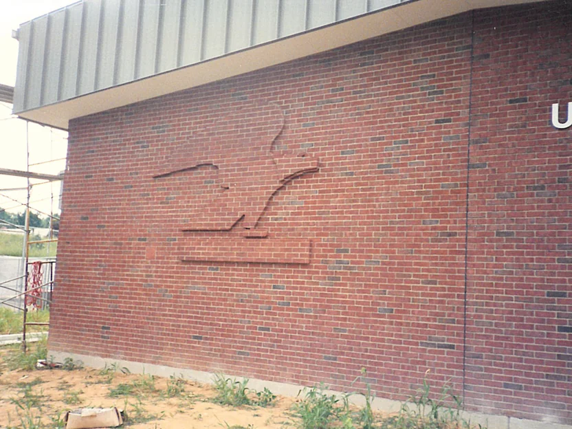 The eagle elevation in 1994 with scaffolding standing at the left and the ground still bare