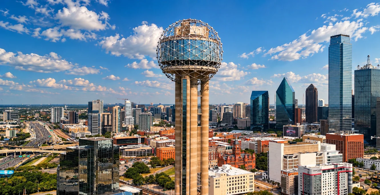 Reunion Tower and the downtown Dallas skyline on a clear day, the red Old Red courthouse below