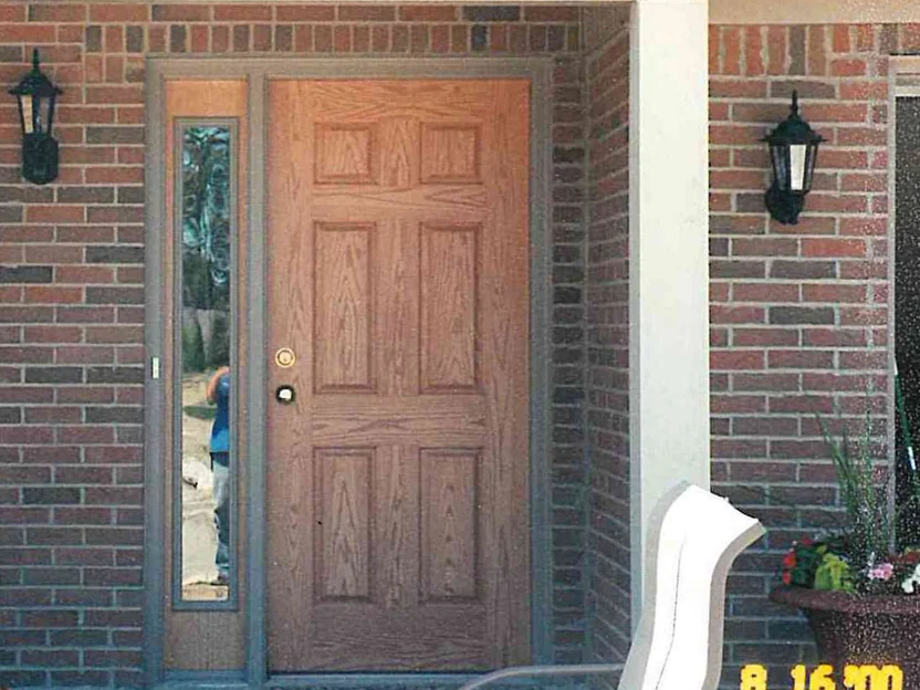 The same entry after the work in 2000, the pale units darkened so the wall reads as one red and brown range