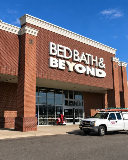 The Bed Bath & Beyond storefront in Pickerington in 2019, its entrance piers and the wall behind them reading as one red brick