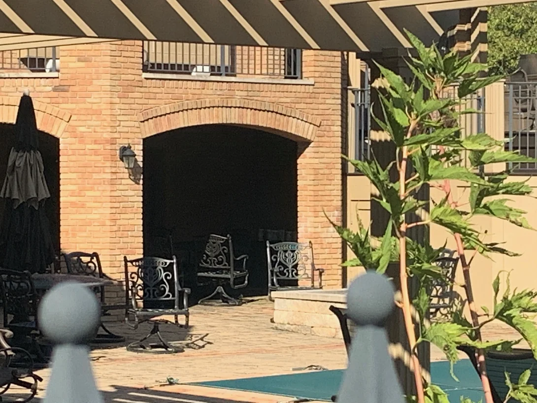 One of the arches close up in 2019, the tapered shapes over the opening sitting in the same color as the brick on either side