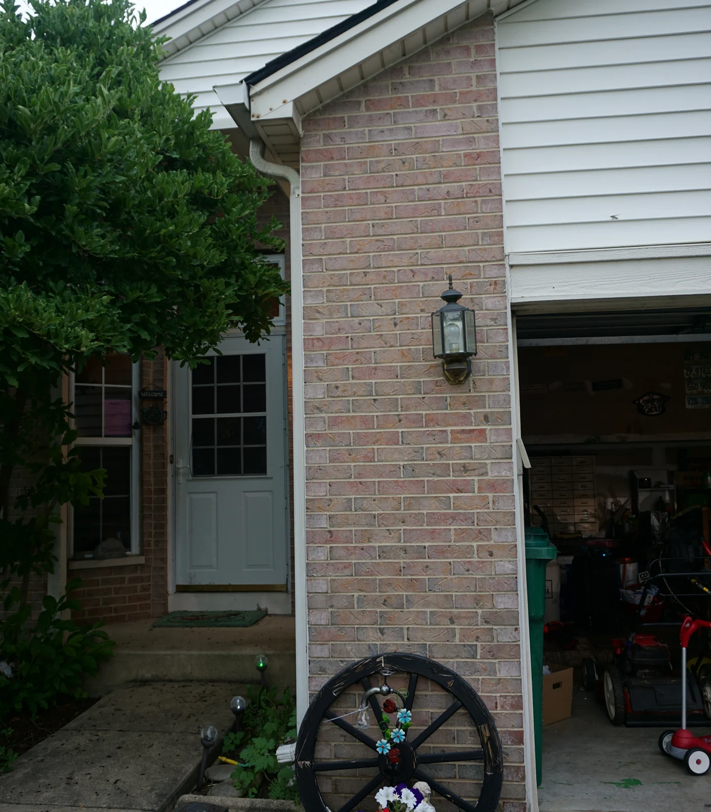 The front of a Romeoville, Illinois home in 2019, its brick one even range twenty-two years after the dark units were lightened