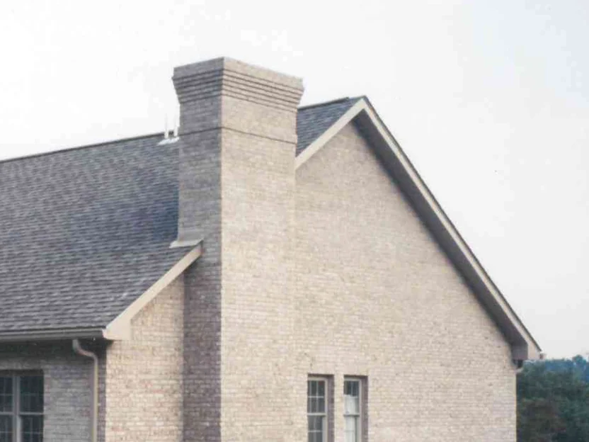 The same gable end and chimney later in 2000, the brick now an even warm tan across both faces