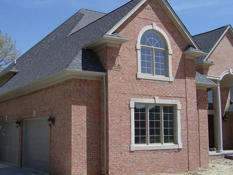 The same garage wing and entrance in 2007 after the work, the brick one deeper red range from the garage doors to the portico, a ladder still against the wall